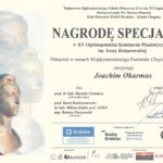 Joachim Okarmus - Dyplom Nagroda Specjalna w XV Ogólnopolskim Konkursie Pianistycznym im. Ireny Rolanowskiej, Kraków 2024. Laureat – Joachim Okarmus, nauczycielka – Maria Wosiek, organizator – Państwowa Ogólnokształcąca Szkoła Muzyczna II stopnia im. Fryderyka Chopina w Krakowie. Dyplom w barwach żółtych z popiersiem Fryderyka Chopina umieszczonym w lewym dolnym rogu, logotypami sponsorów u dołu dyplomu oraz czarnymi napisami.